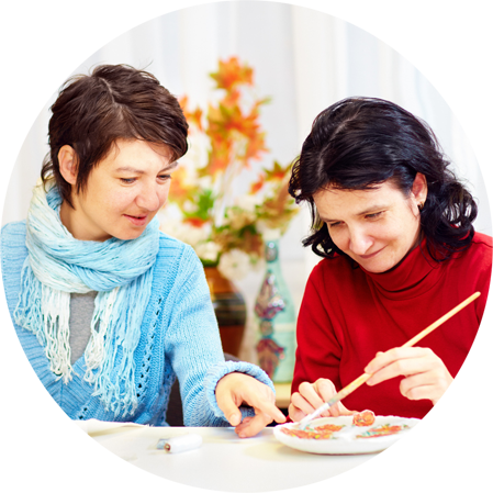 Women painting and enjoying their time together